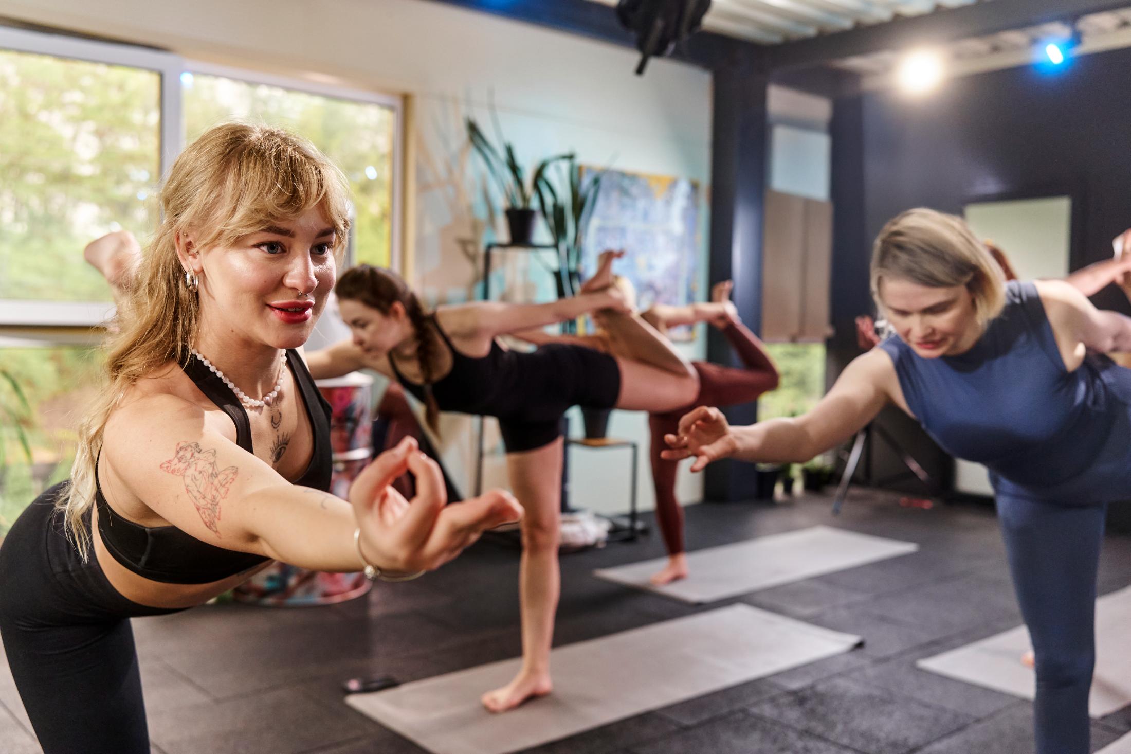 Yoga mats and supportive props arranged for a mindful movement session